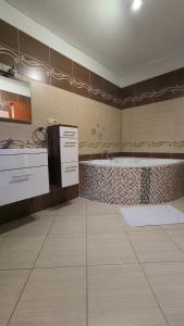 Kuchyňa alebo kuchynka v ubytovaní Apartmán Pavlík