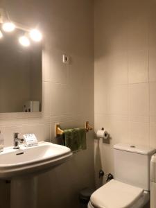 Kúpeľňa v ubytovaní Apartamento Turístico Sigüenza