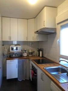 Kuchyňa alebo kuchynka v ubytovaní Apartamento Turístico Sigüenza