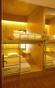 Postel nebo postele na pokoji v ubytování Leaf Sustainable Hostel