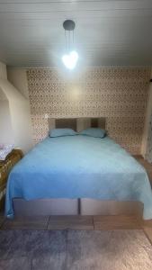 Postel nebo postele na pokoji v ubytování Quarto Aconchegante N 2