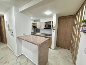Кухня или мини-кухня в Apartamento en el Norte de Barranquilla
 +7 фотографий