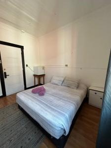 Cama ou camas em um quarto em VOY Hostales - Oriente