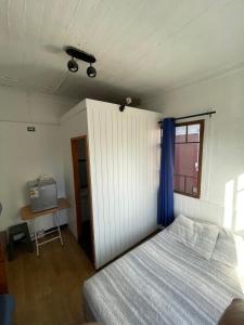 Cama ou camas em um quarto em VOY Hostales - Oriente
