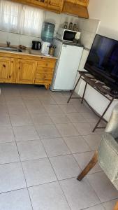 Η κουζίνα ή μικρή κουζίνα στο Habitación Pink