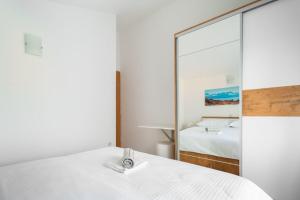 Posteľ alebo postele v izbe v ubytovaní Apartments Lux 3