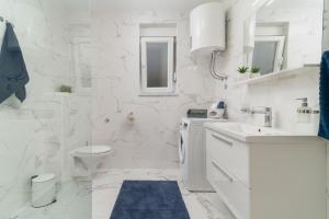 Kúpeľňa v ubytovaní Apartments Lux 3