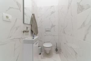 Kúpeľňa v ubytovaní Apartments Lux 3