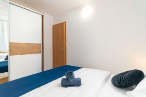Posteľ alebo postele v izbe v ubytovaní Apartments Lux 3