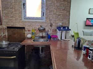 Η κουζίνα ή μικρή κουζίνα στο شاليه المحبه قريه عايده الساحل الشمالي