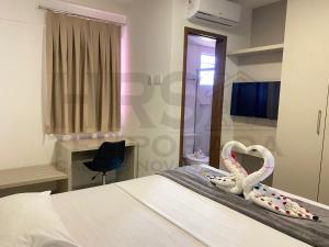 Foto da galeria de Evian Thermas Hotel Incrível no Centro de Caldas Novas com Águas Termais e Ingressos com Valores Exclusivos no Hot Park, Lagoa Termas, Náutico e WaterPark em Caldas Novas