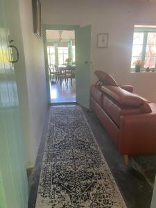 O zonă de relaxare la Galway Cottage ADL Retaining Pty Ltd trading as Murphys Coittages +29 fotografii