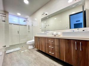 Ванная комната в Lecheria Bello Apartamento 9 personas - de Lujo +47 фотографий