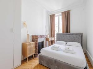 Ένα ή περισσότερα κρεβάτια σε δωμάτιο στο Spacious apartment 3BDR 6P - Neuilly sur Seine
