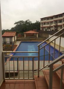 a view of a swimming pool from a balcony at APARTAMENTO DE LUJO SAN GIl in San Gil