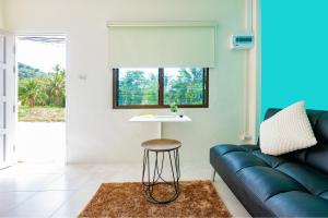 Μια τηλεόραση ή/και κέντρο ψυχαγωγίας στο Songbird Suites