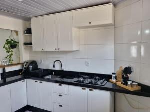 Køkken eller tekøkken på Casa da Karin