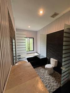 Koupelna v ubytování Igna Bungalows
