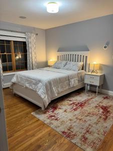 Ένα ή περισσότερα κρεβάτια σε δωμάτιο στο Cozy Room by Hofstra University