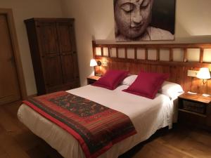 Postel nebo postele na pokoji v ubytování Hostal Otsoa