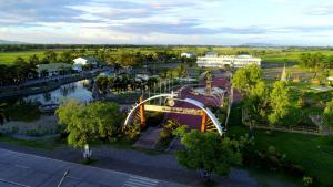 an overhead view of a park with a roller coaster at RedDoorz @ Bansud Oriental Mindoro in Bansud