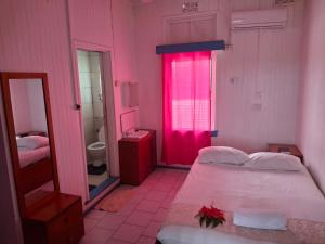 Postel nebo postele na pokoji v ubytování Tavua Hotel Ismail Investments