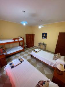 Ένα ή περισσότερα κρεβάτια σε δωμάτιο στο Santa Martina +8 φωτογραφίες