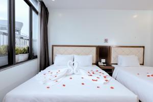 Postel nebo postele na pokoji v ubytování DaNa Sailing Hotel + 23 fotografií