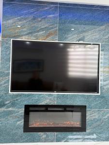 TV a/nebo společenská místnost v ubytování Beachfront Apartment in Luquillo at Sandy Hills