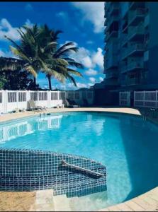 Bazén v ubytování Beachfront Apartment in Luquillo at Sandy Hills nebo v jeho okolí