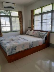 Postel nebo postele na pokoji v ubytování Sukhothai Hotel