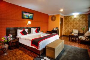 Postel nebo postele na pokoji v ubytování Taleju Boutique Hotel + 37 fotografií