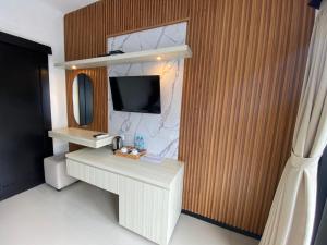 TV a/nebo společenská místnost v ubytování Igna Bungalows