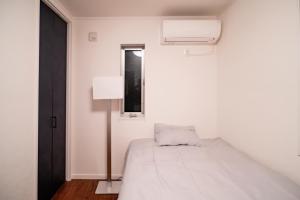 Voodi või voodid majutusasutuse 全新三之轮一户建a栋 toas