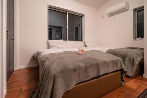 Voodi või voodid majutusasutuse 全新三之轮一户建a栋 toas