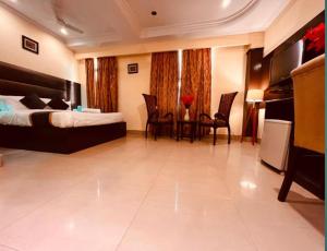 Voodi või voodid majutusasutuse The Reo Lodge, Haridwar toas