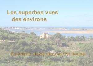 a view of a river and a house on a hill at Maison de la Lagune in Oualidia