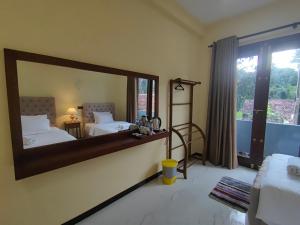 Postel nebo postele na pokoji v ubytování Villa Infinity Negombo