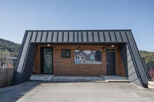 a small brick building with two doors on it at Gyeongju Davulchon Pension in Gyeongju