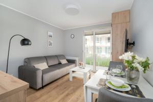 Posedenie v ubytovaní Jasny & Elegancki Apartament typu Studio z Tarasem by Noclegi Renters