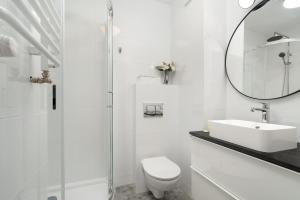 Kúpeľňa v ubytovaní Jasny & Elegancki Apartament typu Studio z Tarasem by Noclegi Renters