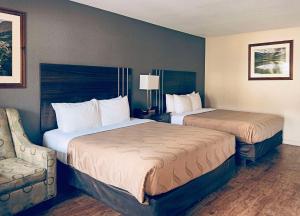 Postel nebo postele na pokoji v ubytování Quality Inn Durango