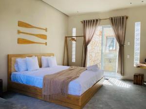 Imagen de la galería de Emerald Beach Homestay, en Bình Sum