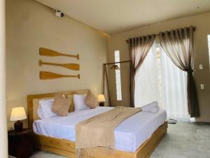Imagen de la galería de Emerald Beach Homestay, en Bình Sum 29 fotos más