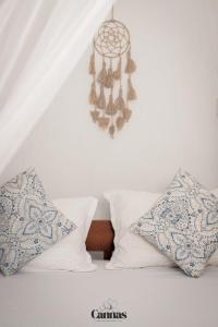 Ένα ή περισσότερα κρεβάτια σε δωμάτιο στο Cannas Hiri