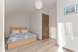 Postel nebo postele na pokoji v ubytování RESORT Riva & Avir