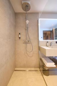 Ένα μπάνιο στο LH Suites Aparthotel NEW OPENING inkl JokerCard