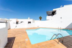 The swimming pool at or close to Faro de sardina Apartment