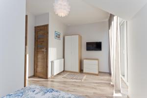 Postel nebo postele na pokoji v ubytování RESORT Riva & Avir