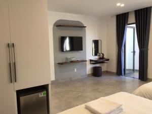 Μια τηλεόραση ή/και κέντρο ψυχαγωγίας στο Auriluna Hotel +17 φωτογραφίες